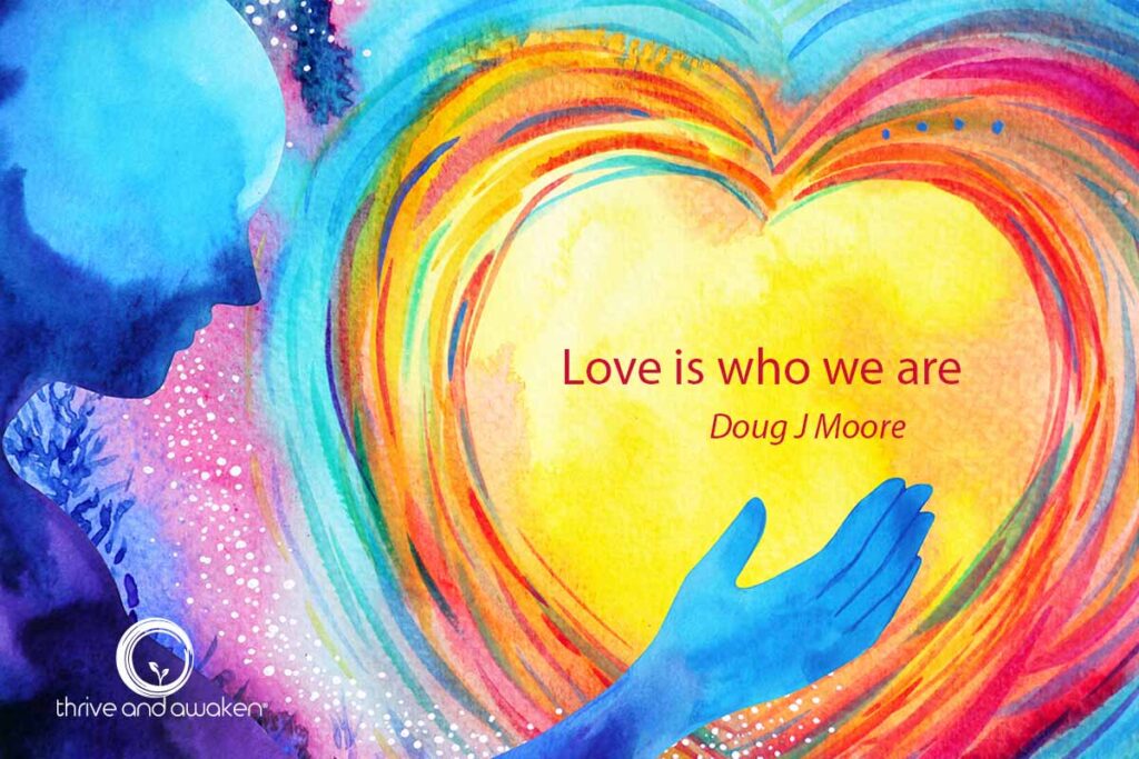 Person holding heart. Saying inside is: Love is who we are